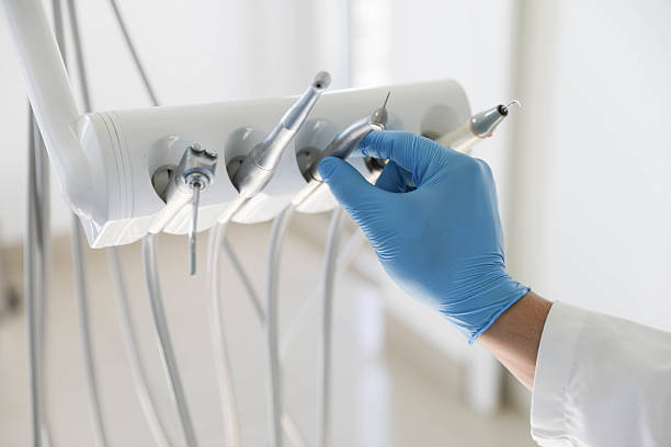 Professional Tooth Extraction technician working in Burke Centre, VA